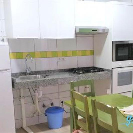 Kitchen in wheelchair accessible apartment